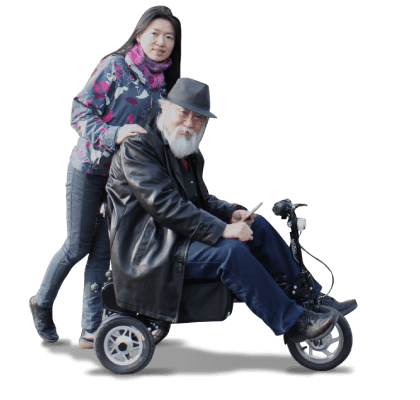 Sumi Wang with her father, the creator of eFOLDi, who's sitting on the eFOLDi scooter