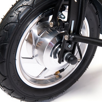 Close-up of the eFOLDi MK1.5 scooter front wheel from the side