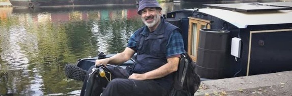 Alan by a river