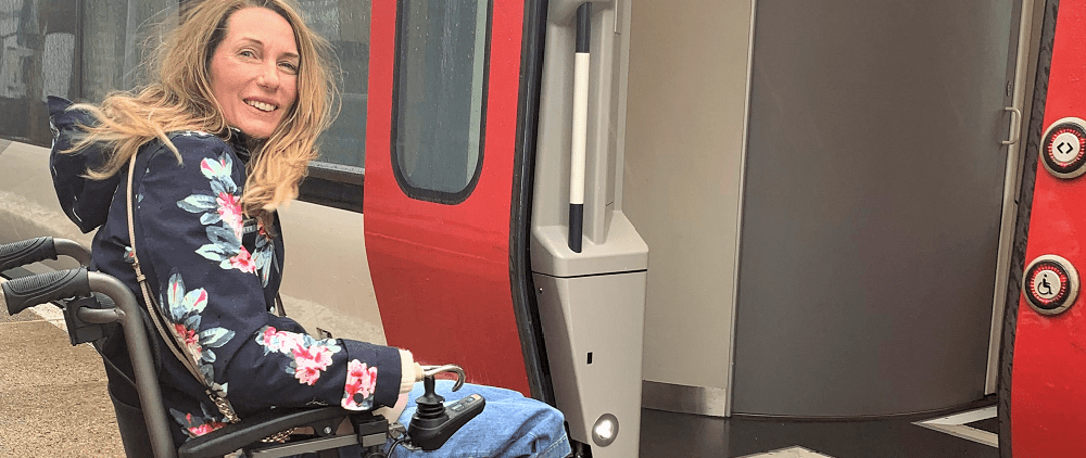 Debbie getting on a train