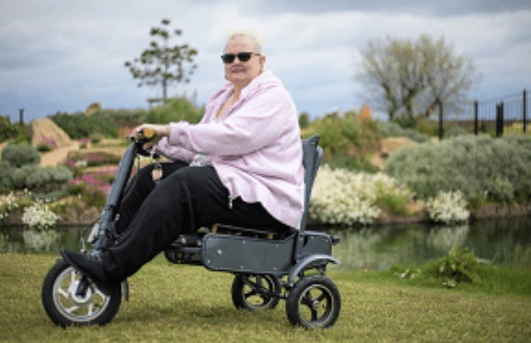 Debbie on scooter