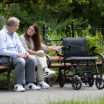 man and woman on bench