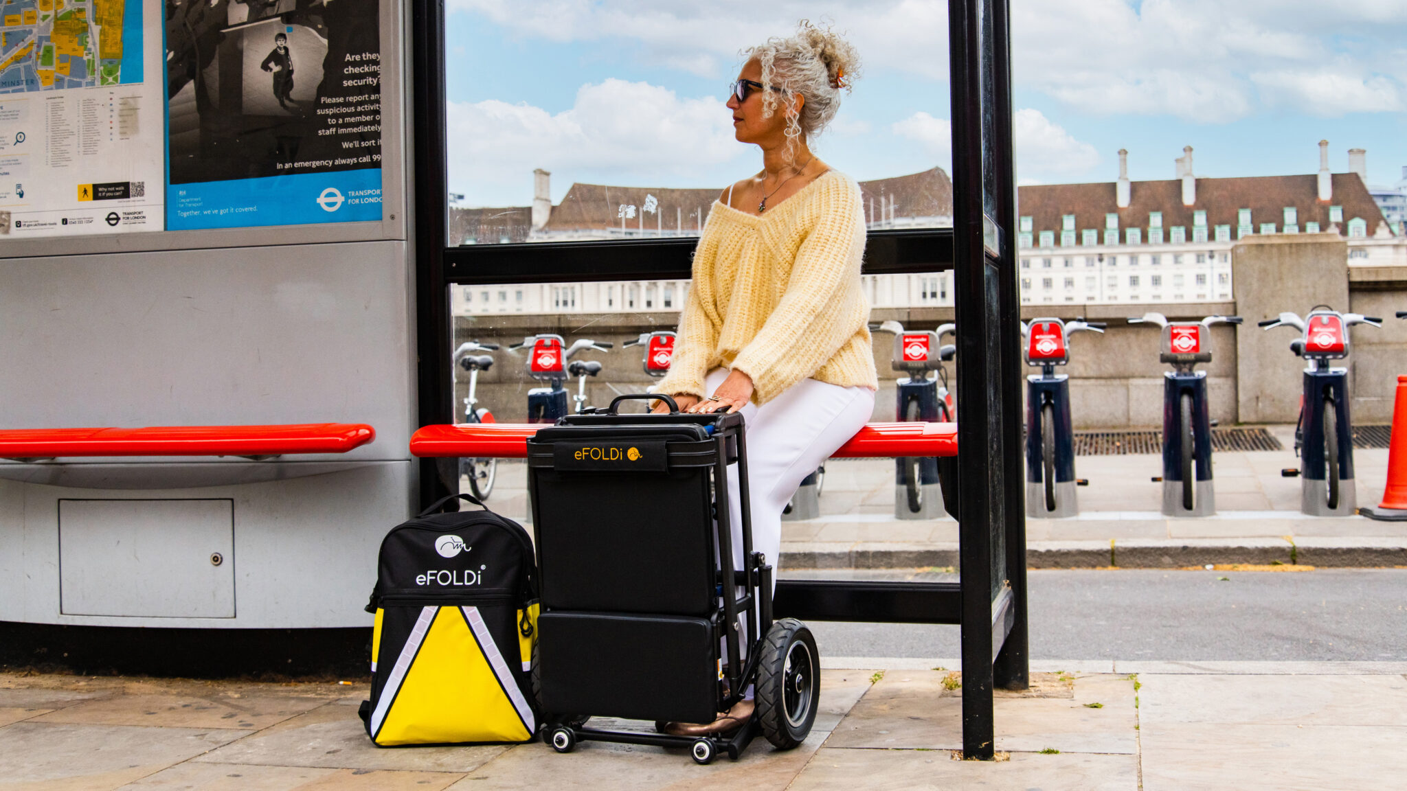 Lady waiting at the bus stop